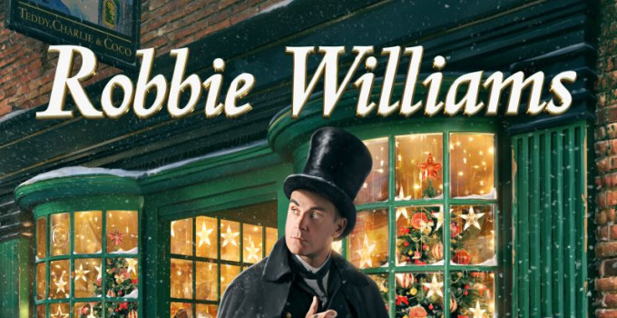 ROBBIE WILLIAMS: esce oggi il suo primo disco di Natale “THE CHRISTMAS PRESENT” con special guests